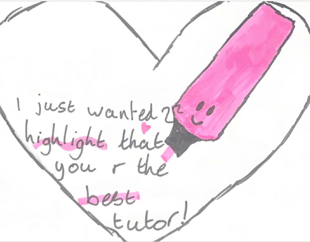 A multicoloured picture of a pupil's drawing competition entry. The picture features a heart with a smiley faced pink felt-tip pen and black heart with a note which reads, 'I just wanted to highlight that you are the best tutor!'